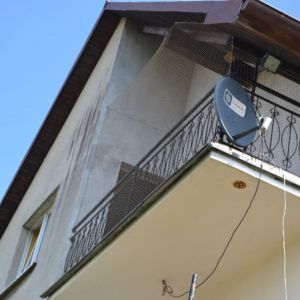 ZABEZPIECZENIE TARASU SIATKĄ DLA KOTA Z ZADASZENIEM - GDYNIA